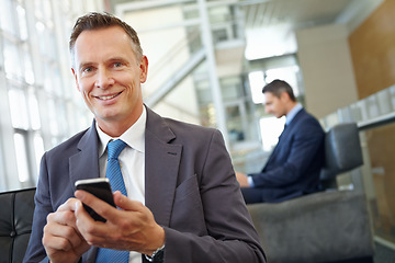 Image showing Portrait, happy or business man with phone in office for motivation, company research or website review. Manager or CEO with smartphone in hotel lobby for social network, internet or mobile app