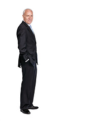 Image showing Portrait of a senior business man smiling and happy while standing isolated against a studio white background. Caucasian, mature and executive corporate CEO or professional employee