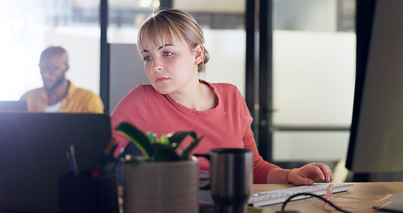 Image showing Creative woman, laptop and computer in marketing, advertising or web design multi tasking at the office. Female employee designer in market research comparing data on technology for company startup