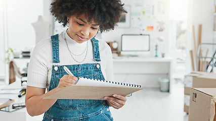 Image showing Stock, planning and logistics with business owner doing inventory and ecommerce orders on laptop in office. Retail, management and woman factory manager writing list for shipping box delivery package