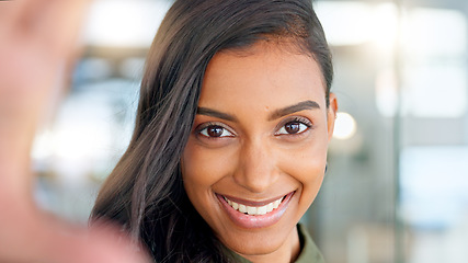 Image showing Smiling, beautiful and fresh female face winking feeling fun, silly and playful. Portrait of a happy woman head with perfect skin and healthy teeth. Closeup of a carefree natural beauty with a smile