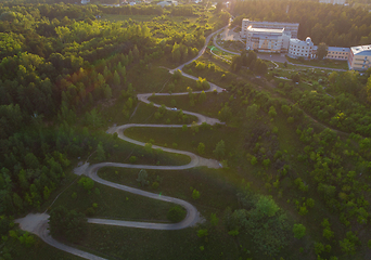 Image showing Aerial top vew of winding road in the city