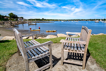 Image showing Small boats lining waterfront in Wickford Cove