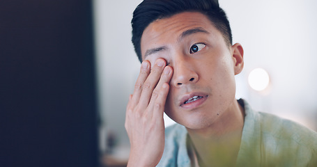 Image showing Asian businessman, tired and hand on face in communication office, headache and marketing company. Man, computer or late night reading with burnout, target or kpi at digital marketing agency in Tokyo