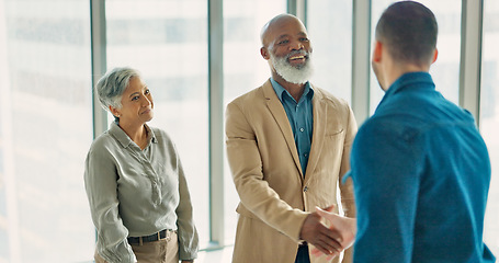 Image showing Handshake, welcome and thank you with business people in office after interview with manager. Shaking hands, diversity and b2b partnership, collaboration or happy business deal, success and teamwork