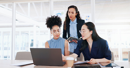 Image showing Business women, laptop and collaboration in office for marketing management, leader innovation or strategy research. Team meeting, employee support and tech manager or leadership idea discussion