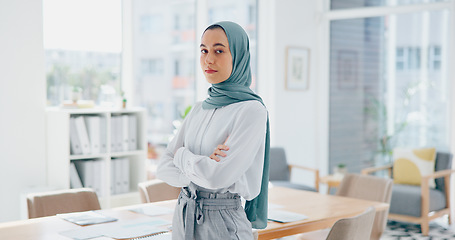 Image showing Muslim executive, woman and face with arms crossed in office for vision, success and goal in web design startup. Islamic business leader, mission and focus with goals, dream and innovation in Dubai