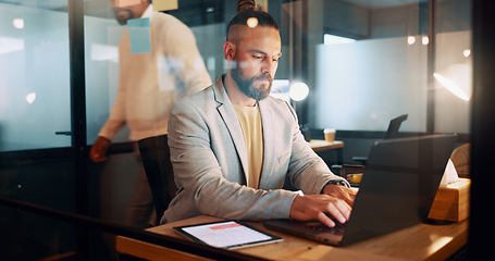 Image showing Laptop, typing and man in office writing an email, internet research or performance data report. Technology, communication and startup businessman working on project or networking on computer at desk