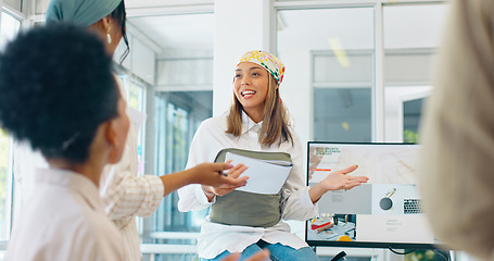 Image showing Business women, teamwork or diversity meeting on paper or documents review in coaching or training feedback. Smile, happy or talking speaker in leadership workshop, collaboration or strategy planning