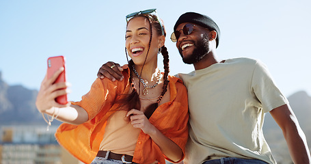 Image showing Couple, bonding and phone selfie on city building rooftop on New York summer holiday, travel vacation date or social media memory. Smile, happy or black man and woman on mobile photography technology