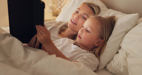 Image showing Tablet, bed and relax with a girl and mother watching or streaming series on a subscription service while lying in a bedroom. Family, love and kids with a woman and daughter bonding together at home