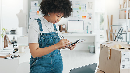 Image showing Stock, planning and logistics with business owner doing inventory and ecommerce orders on laptop in office. Retail, management and woman factory manager writing list for shipping box delivery package