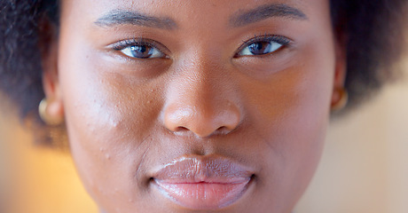 Image showing Confident and proud black woman smiling, showing strength and dignity. Closeup of the face and head of a beautiful young african american female showing her teeth with a big smile and feeling happy