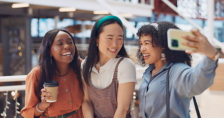 Image showing Selfie, friends and social media with woman together posing for a photograph in a mall or shopping center. Phone, social media and smile with a happy female friend group taking a picture for fun