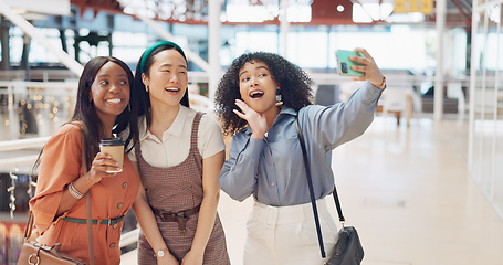 Image showing Selfie, friends and social media with woman together posing for a photograph in a mall or shopping center. Phone, social media and smile with a happy female friend group taking a picture for fun