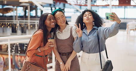 Image showing Selfie, friends and social media with woman together posing for a photograph in a mall or shopping center. Phone, social media and smile with a happy female friend group taking a picture for fun