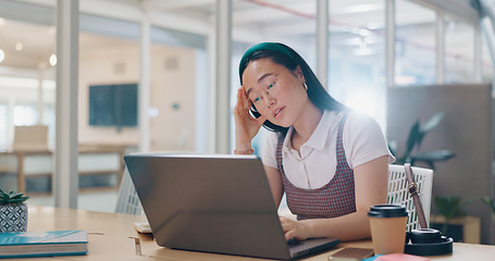 Image showing Laptop, burnout or woman with headache, stress or fatigue at office desk working on a digital marketing SEO project. Tired, overworked or upset Japanese employee frustrated with migraine pain problem