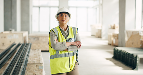 Image showing Construction, senior engineer and portrait of woman at indoor maintenance and building site. Elderly leader, architect and industrial contractor at architecture project to plan, monitor and lead.