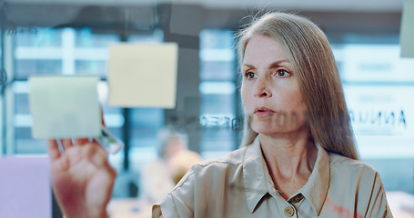 Image showing Planning, sticky notes and marketing woman with a board writing information or research for a project. Analytics, creative and professional female employee from Canada working on advertising strategy