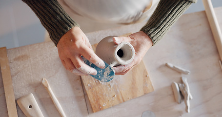 Image showing Pottery, art and senior asian woman mold clay in home studio or workshop. Potter, artist and retired female from Japan practicing arts, craft and hobby creating mug, cup or handmade ceramic bowl.