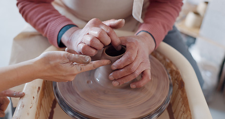 Image showing Hands, pottery and clay with a man student learning from a female potter in the studio or ceramic workshop. Art, creative and sculpting with a woman teacher with a male artisan during a lesson