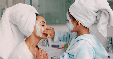 Image showing Family, facial and mask with mother in bathroom with young child using hand to apply cosmetics. Wellness, black family and face cosmetic pamper treatment with kid and mama in happy home.