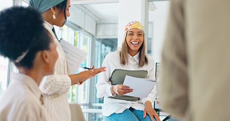 Image showing Business women, teamwork or diversity meeting on paper or documents review in coaching or training feedback. Smile, happy or talking speaker in leadership workshop, collaboration or strategy planning