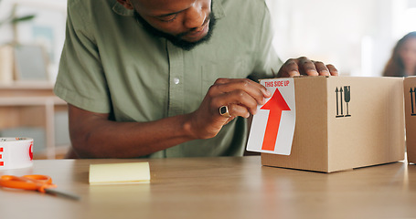 Image showing Ecommerce, logistics and small business, man with package for delivery of unique product in home office. Success, online retail startup, and businessman putting label on box for international export