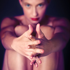 Image showing Beauty, skincare and creative with hands of woman for wellness, art and designer. Expression, health and cosmetics with girl model and fingers intertwined for makeup, seductive and sexy in studio