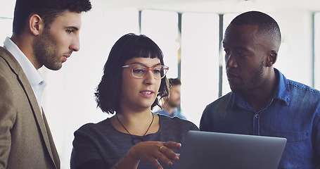 Image showing Tablet, discussion and team of business people in the office doing research for a corporate project together. Collaboration, professional and group of employees working on a report on a mobile device