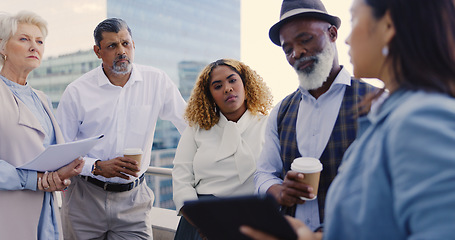 Image showing Teamwork, meeting and business people on rooftop in city with tablet discussing sales project. Technology, collaboration and group of employees planning advertising or marketing strategy outdoors.