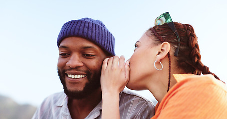 Image showing Whisper, communication and friends in a gossip conversation about secret, rumor or interesting couple news. Rooftop discussion, talking in ear and gen z woman share information to listening black man