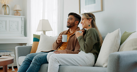 Image showing Relax, coffee and watching tv with couple on sofa together for movie, streaming service or television. Happy, love and tea with man and woman in living room at home for video, film and news lifestyle