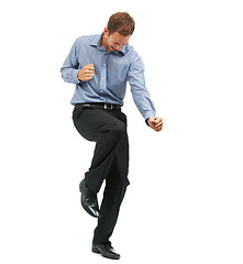 Image showing Happy, dance and businessman in studio for celebration, success and good news on white background. Goal, achievement and male entrepreneur dancing, positive and excited for company goal with mockup