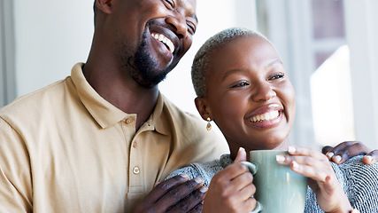 Image showing Relax, love and couple hug with coffee drink break at window to enjoy while they bond together. Kind, caring and happy boyfriend giving black woman beverage with romantic embrace in home.