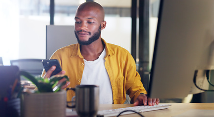 Image showing Black man, phone and office chat while online for communication, social media or reading email, news or content creator post. Smile on face of employee at desk for project research on website