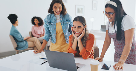 Image showing Laptop, success or women high five at work in celebration of digital marketing sales goals or kpi target. Happy, winner or excited employees hugging to celebrate bonus, business growth or achievement