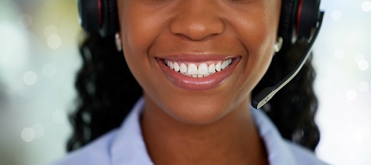 Image showing Call center, smile and black woman for customer service, support and telemarketing in CRM office. Face of receptionist person with white teeth for communication, consulting and contact us help desk