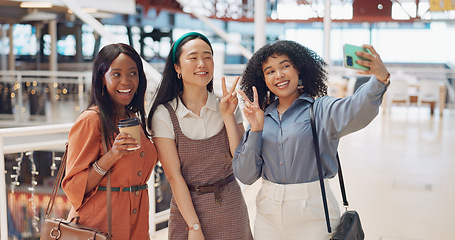 Image showing Selfie, friends and social media with woman together posing for a photograph in a mall or shopping center. Phone, social media and smile with a happy female friend group taking a picture for fun