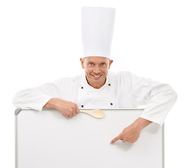 Image showing Chef, portrait and a man with menu mockup space, poster or billboard for advertising special or brand. Happy person with board or sign and spoon advertising restaurant or cafe on a white background