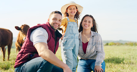 Image showing Family, farm and agriculture with a girl, mother and father on a field or meadow of grass with cattle. Sustainability, love and children with a man, woman and daughter on a farmer ranch together