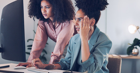 Image showing Computer, black african american woman or manager coaching, training or helping an employee with mentorship at office desk. Leadership, collaboration or worker with a question talking or speaking of