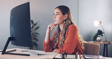 Image showing Business woman, thinking and focus with computer and working, reading and research for company proposal, typing and writing report. Corporate employee, keyboard and computer screen in office