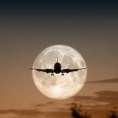 Image showing air plane full moon