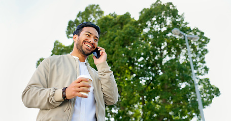 Image showing Young businessman, outdoor phone call and celebration for good news, promotion or success on walk to work. Man, walking and using phone for conversation, networking and winning with goals in morning