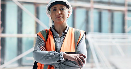 Image showing Logistics, construction and architect working on management of a building at construction site. Portrait of a mature engineer in architecture with arms crossed during maintenance and industrial work