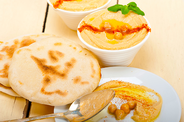 Image showing Hummus with pita bread