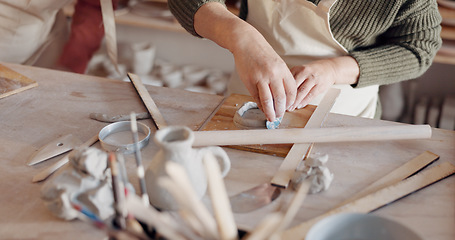 Image showing Pottery, woman and make clay mold in creative class shape, smooth and with artistic tools in studio and workplace. Student works with ceramic cups for art, hobby and sculpting workspace and gallery,