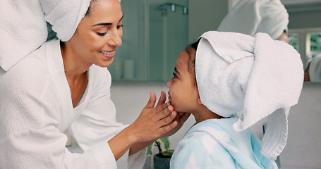 Image showing Mom, face cream and girl in bathroom with beauty product for cosmetics skincare lotion morning self care routine. Happy mother, child with smile and kid love bonding together learning cosmetic health