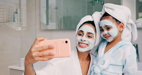 Image showing Selfie, facial and family with a mother and daughter in the bathroom of their home together. Children, love and photograph with a woman and girl kid posing for a picture while bonding in the house